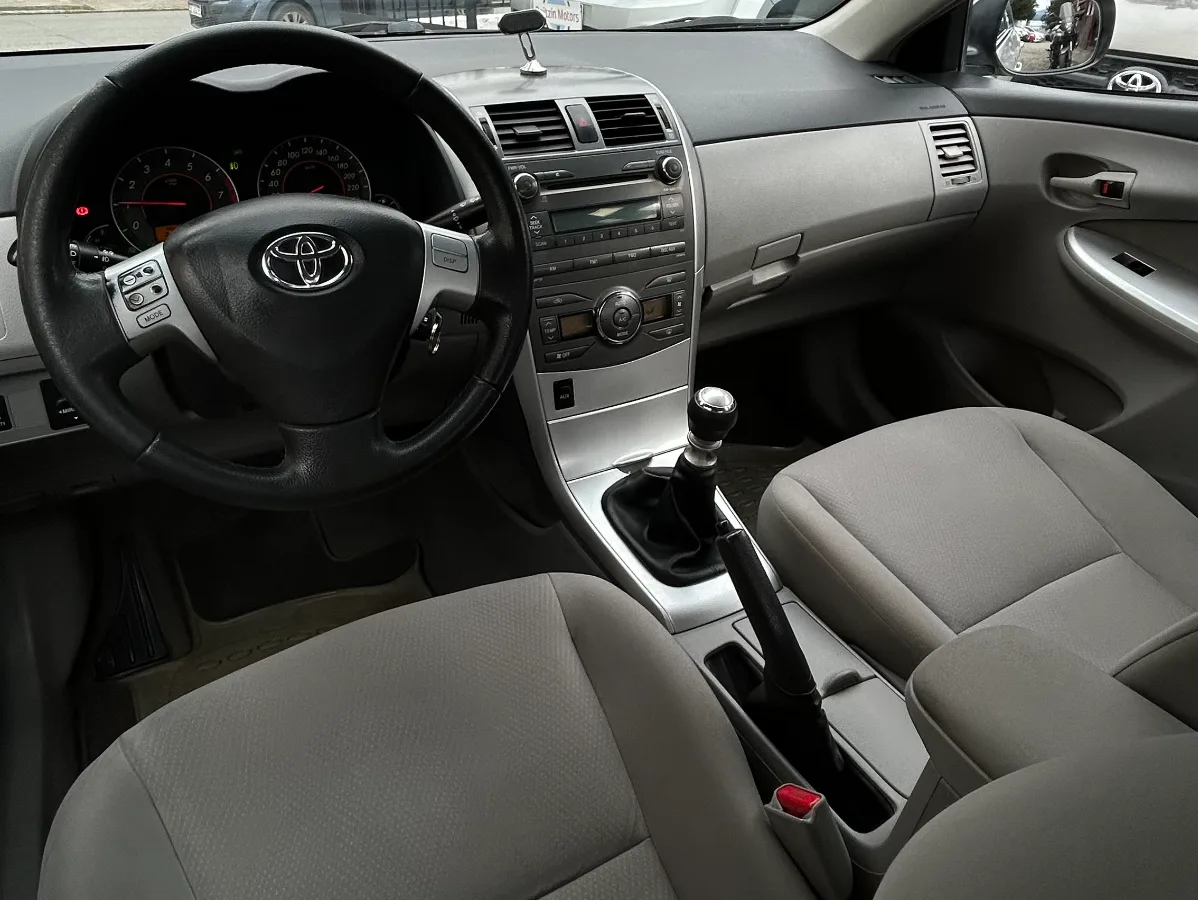 Toyota Corolla 2014 — foto 8